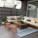 Sofá en L de 200 por 300 cm + sector de quincho - Terraza grande con sillo en L.jpg