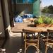Sofás de 3 y 2 cuerpos + comedor - terraza grande con comedor de madera.jpg