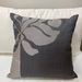Cojines en tonos negros con blanco, grises y otros - cojin decorativo gris con diseño de hojas.jpeg
