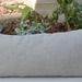 Cojín decorativo de exterior premium de 70 por 35 cm - cojin de exterior con flecos calidad alta.jpeg