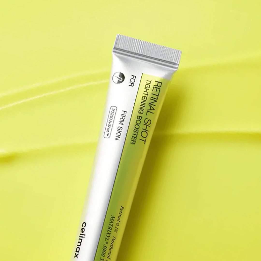 Detalle del tubo plateado y verde de Celimax Retinal Shot Tightening Booster 15ml con aplicador de punta fina.